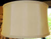 Drum shade that is a shallow drum short barrel shade
